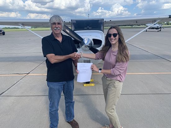 Eliza with flight examiner