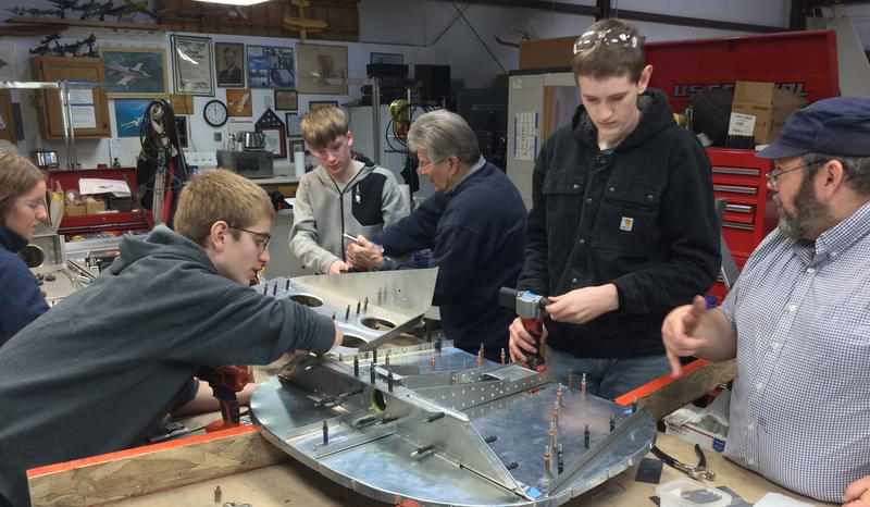 teens at work on the Zenith